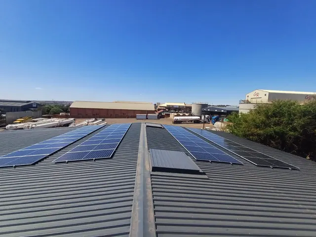Porta Fuel: A commercial rooftop solar PV installation supplying daytime load for a fuel forecourt operation.
